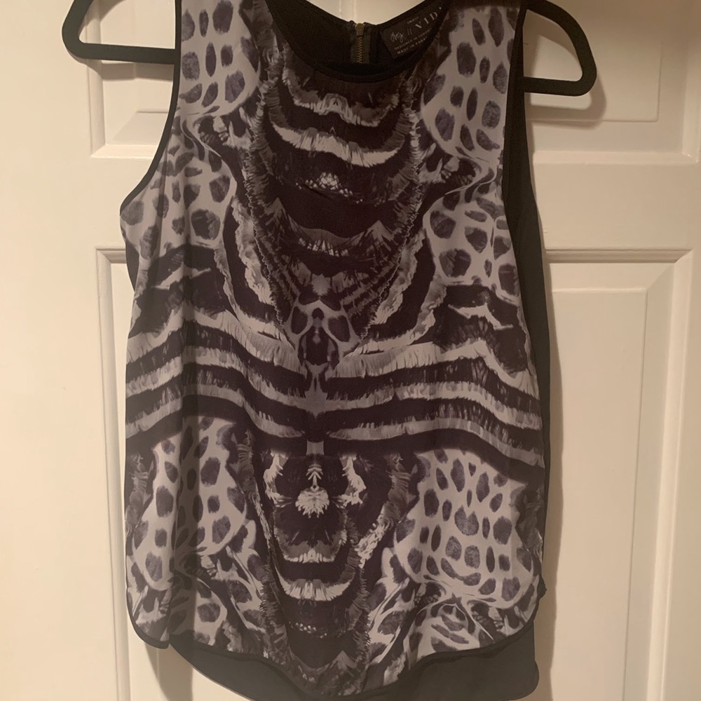 VIDA womens top black w/ animal print. Size S.
